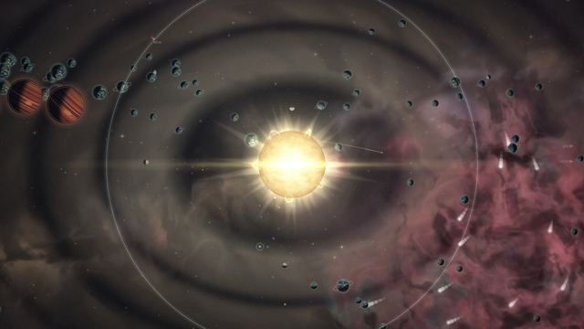 A newly ignited sun-like star surrounded by a glowing disk of planets and debris